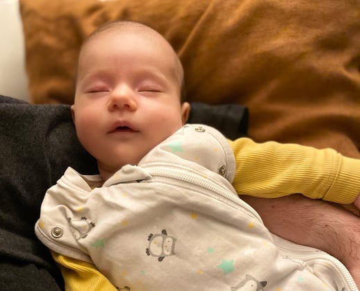 Baby using sleep sack